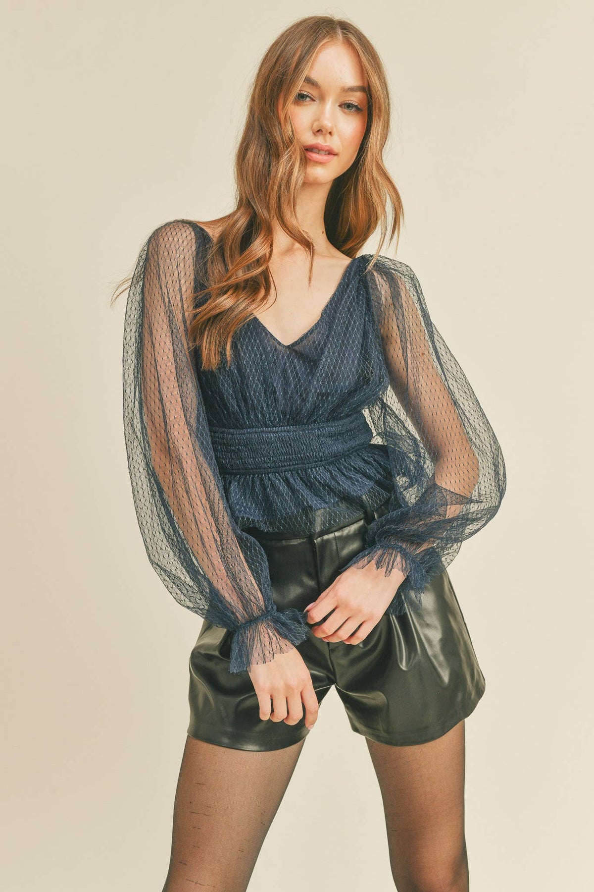 SMOCKED WAIST PEPLUM HEM TOP