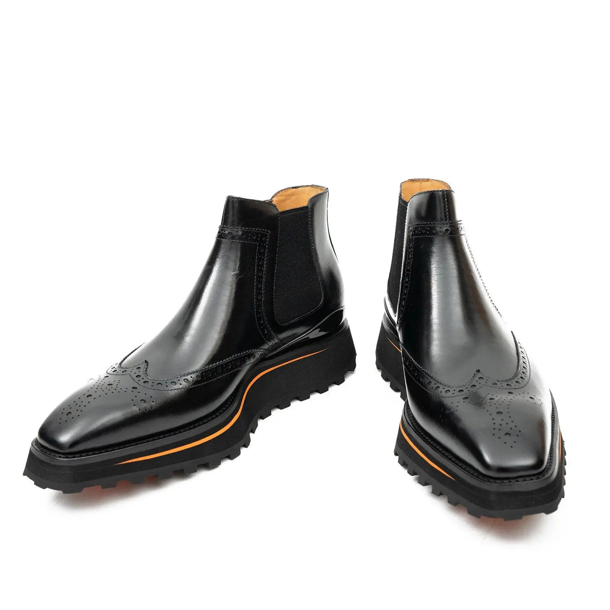 Black Wingtip Chelsea Boots with Brown-Edge Lug Sole