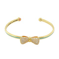 Open Arms Bow Bangle