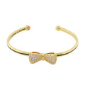 Open Arms Bow Bangle