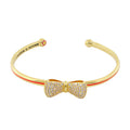 Open Arms Bow Bangle